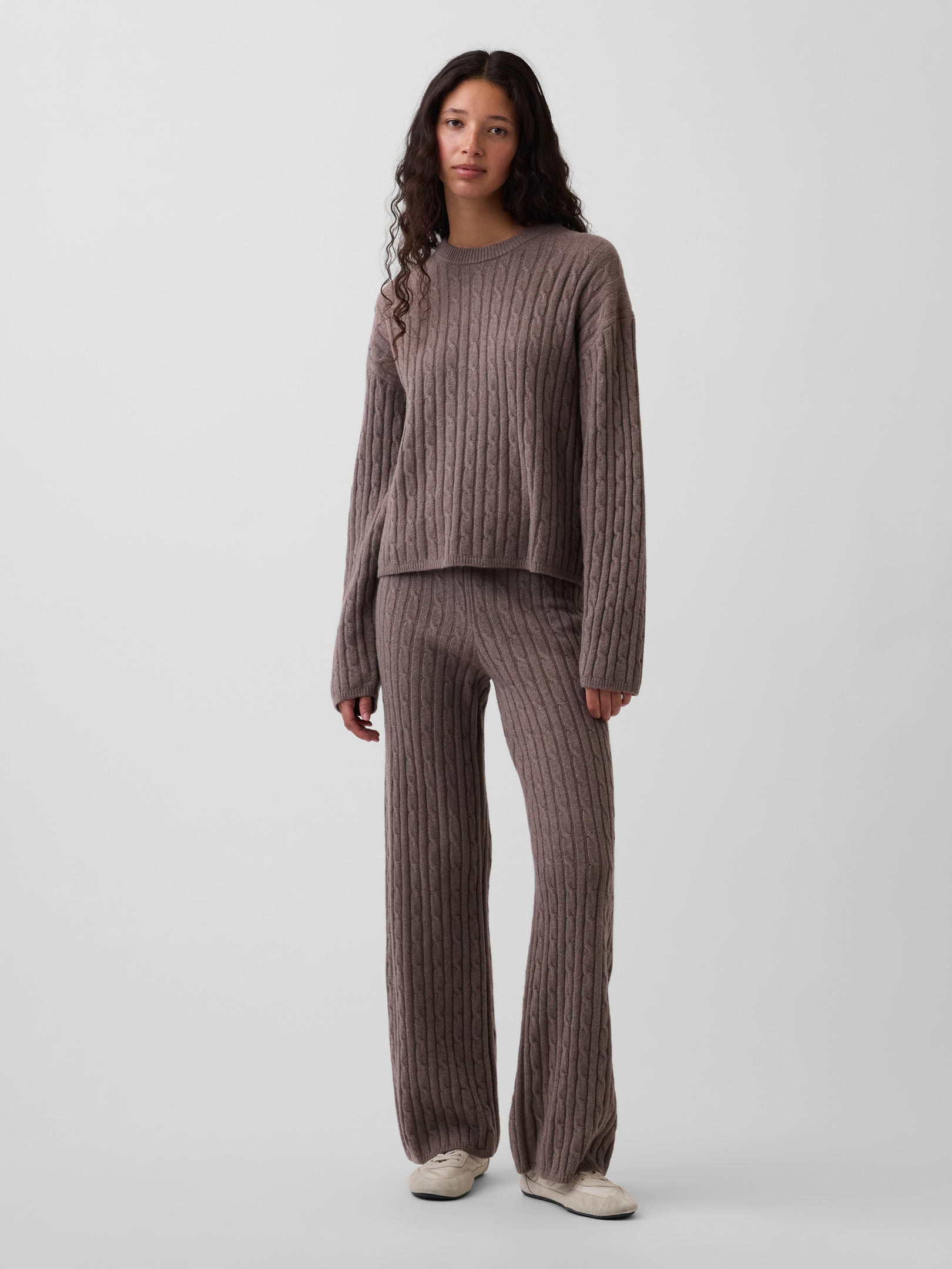 Image 1 of 6, Supersoft cotton-blend cable-knit sweater pants. In a relaxed fit., Elasticized waist., Ribbed hem., This product was made in a factory that invests in gender equity and women’s empowerment through RISE. Learn more at gapinc.com/equity ., Product #910954