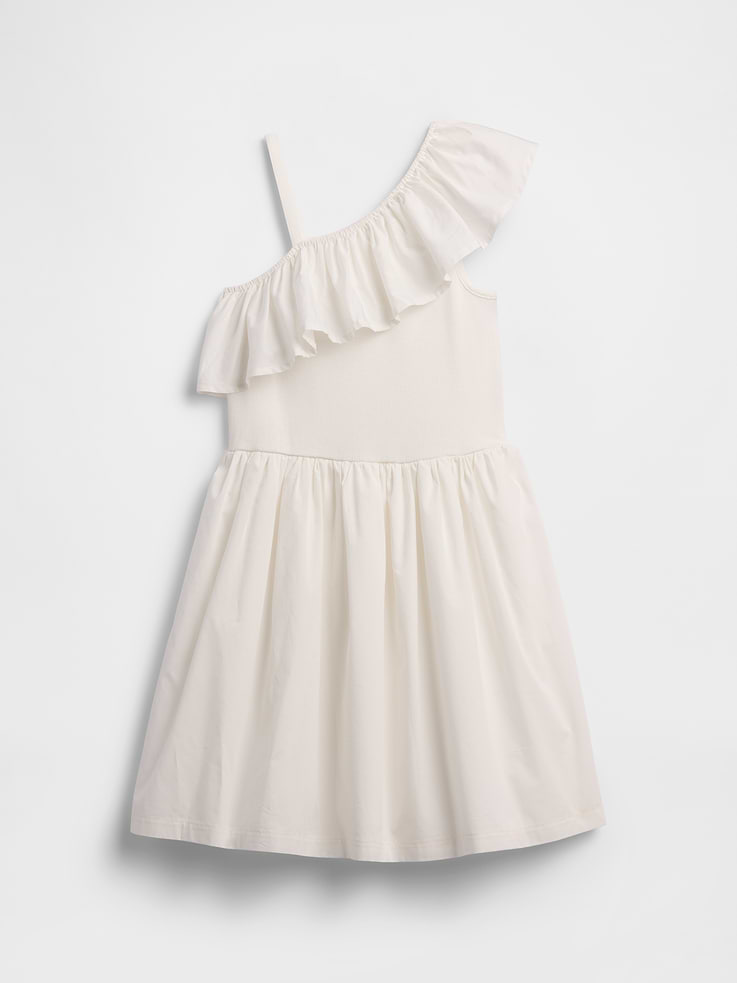 Image 1 of 3, Soft ribbed top with poplin ruffles and skirt., Tank strap., Ruffle trim at elasticized asymmetrical neckline., Shirring at waist., This product was made in a factory that invests in gender equity and women’s empowerment through RISE. Learn more at, Product #1175275