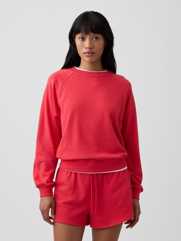 Image 1 of 5, This product is made with/contains 21% recycled polyester. Compared to virgin materials, using recycled materials helps reduce resource use and waste., Soft French terry., Dropped shoulder, long sleeves with banded cuffs., Crewneck., Banded hem., This product was made in a factory that invests in gender equity and women’s empowerment through RISE. Learn more at, Product #1174643