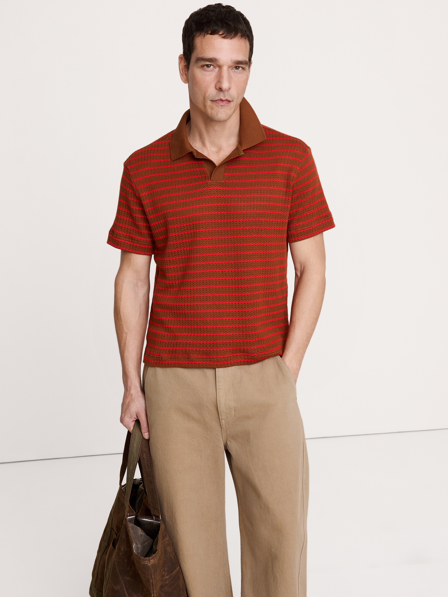 L'image numéro 1 présente Haut à rayures à col polo tricoteuse