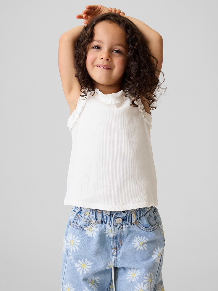 Image 1 of 5, Soft ribbed cotton tank top., Ruffled apron neck., Ruffled tank straps., Certain styles have an allover print., This product was made in a factory that invests in gender equity and women’s empowerment through RISE. Learn more at gapinc.com/equity ., Product #897687