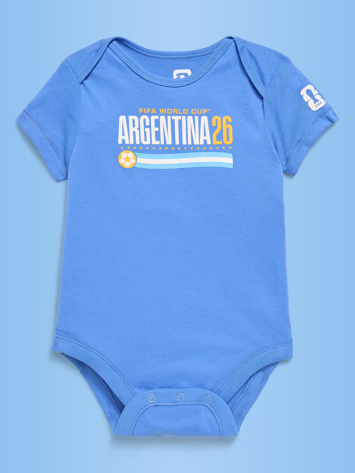 Image 1 of 2, envelope neckline, short sleeves, snaps along inseam, graphic at front, © FIFA, FIFA'S OFFICIAL LICENSED PRODUCT LOGOS, AND ALL BRAND ELEMENTS, DESIGNS AND TRADE NAMES OF FIFA AND FIFAE TOURNAMENTS, EVENTS AND PRODUCTS ARE COPYRIGHTS AND/OR TRADEMARKS OF FIFA., Product #902592