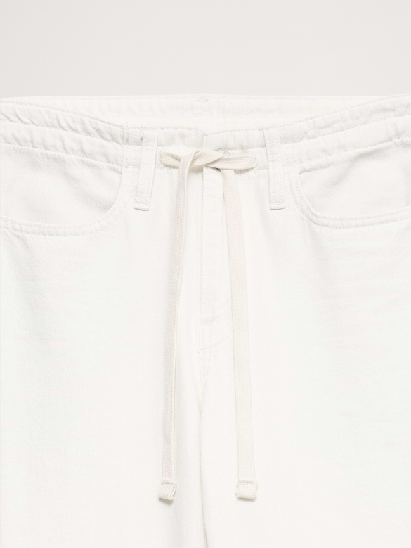 Jean à jambe large et taille mi-basse avec cordon de serrage