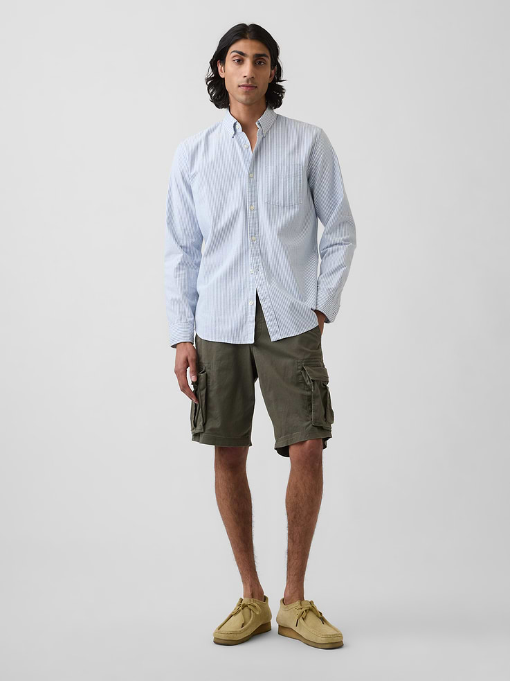 Image 1 of 6, Smooth stretch cotton twill cargo shorts in a relaxed fit., Button closure, zip fly, & inner drawcords., Side slant pockets, back flap welt pockets., Flap patch cargo pockets., Made with 98% regenerative cotton which is grown using holistic agricultural practices that improve soil health, climate resilience, water retention, and local biodiversity., This product was made in a factory that invests in gender equity and women’s empowerment through RISE. Learn more at gapinc.com/equity ., Product #889841