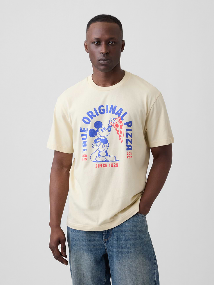 Image 1 of 5, A very special collaboration between Gap and Disney— two timeless, iconic American brands— led us to create a collection that celebrates Mickey Mouse and Minnie Mouse., Soft jersey knit., Dropped shoulder, short sleeves., Crewneck., Graphic at front., Product #1179495