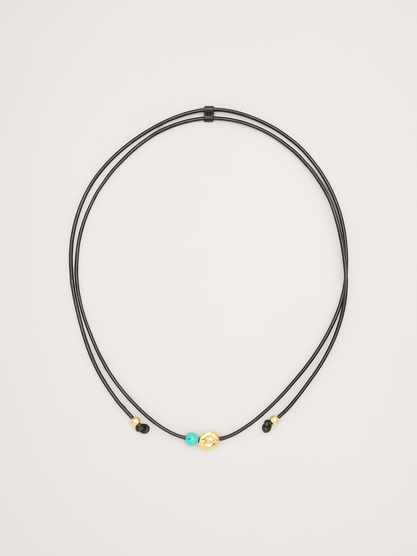 Collier cordon avec pierres métalliques