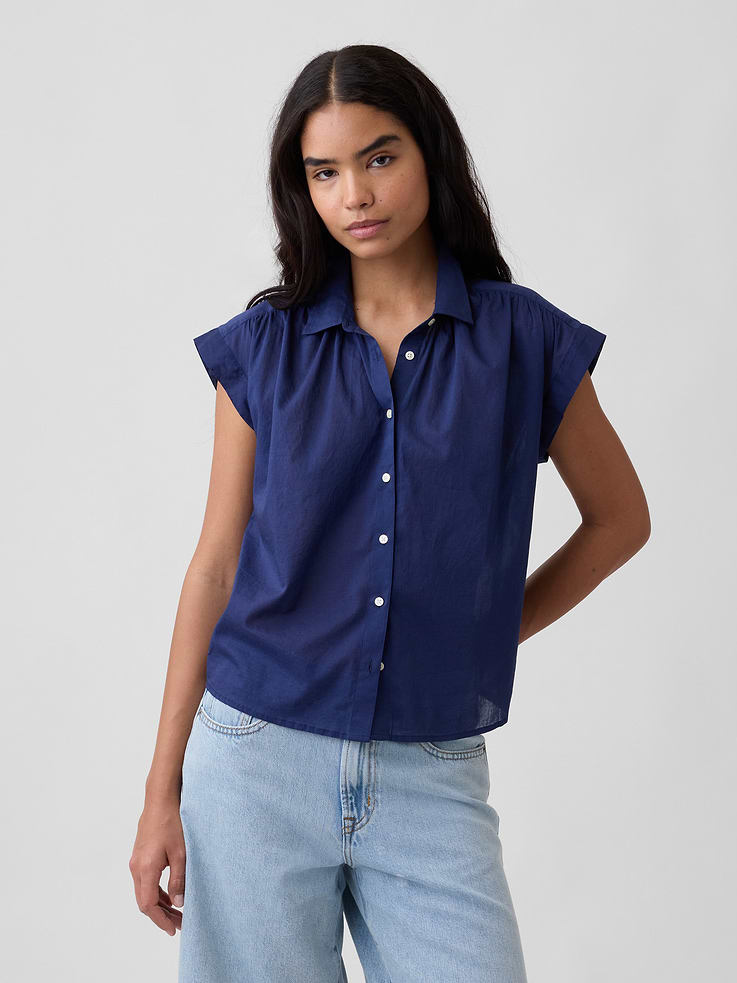 Image 1 of 5, Smooth voile weave., Cap dolman sleeves., Shirring at spread collar and yoke, button front., Select styles have allover print or stripes., This product was made in a factory that invests in gender equity and women’s empowerment through RISE. Learn more at, Product #1172460