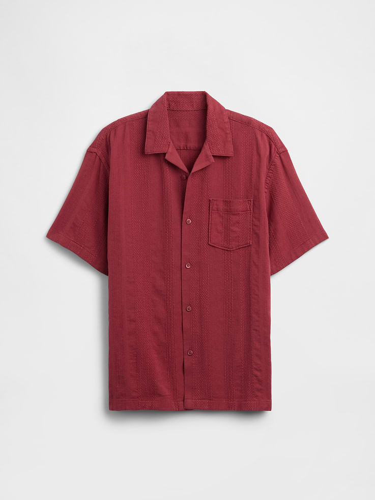 Image 1 of 3, Textured cotton knit., Short sleeves., Notch spread collar, button front., Patch pocket at chest., Select styles have allover print or stripes., This product was made in a factory that invests in gender equity and women’s empowerment through RISE. Learn more at, Product #1172809