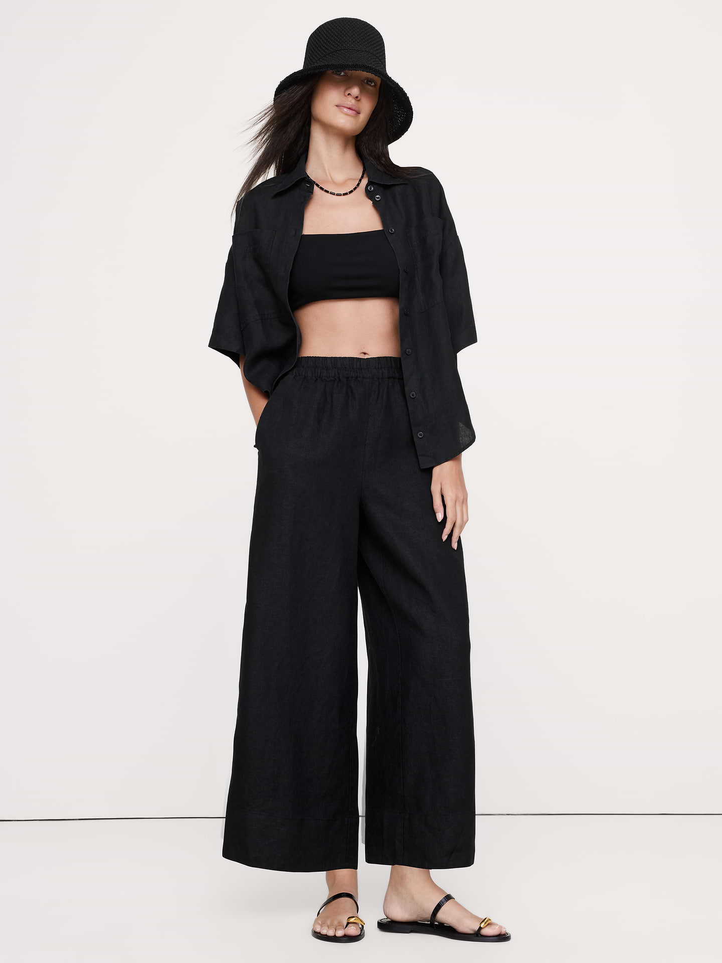 L'image numéro 6 présente Pantalon à taille haute extensible à jambe large en lin longueur cheville