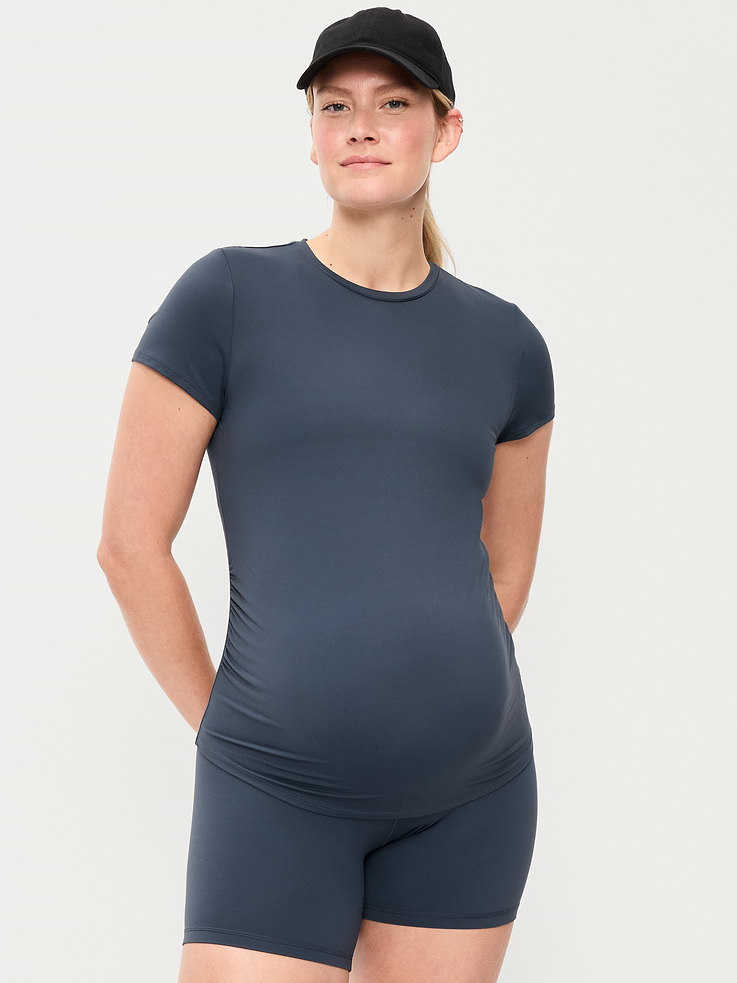 Image 1 of 2, Make your moves in Old Navy Sport's StudioSmooth: A buttery soft, breathable fabric with a barely there feel., crew neck, short sleeves, center seam at back, shirred sides for a flexible fit, sweat-wicking, 4-way stretch, sweat-wicking, Product #899944