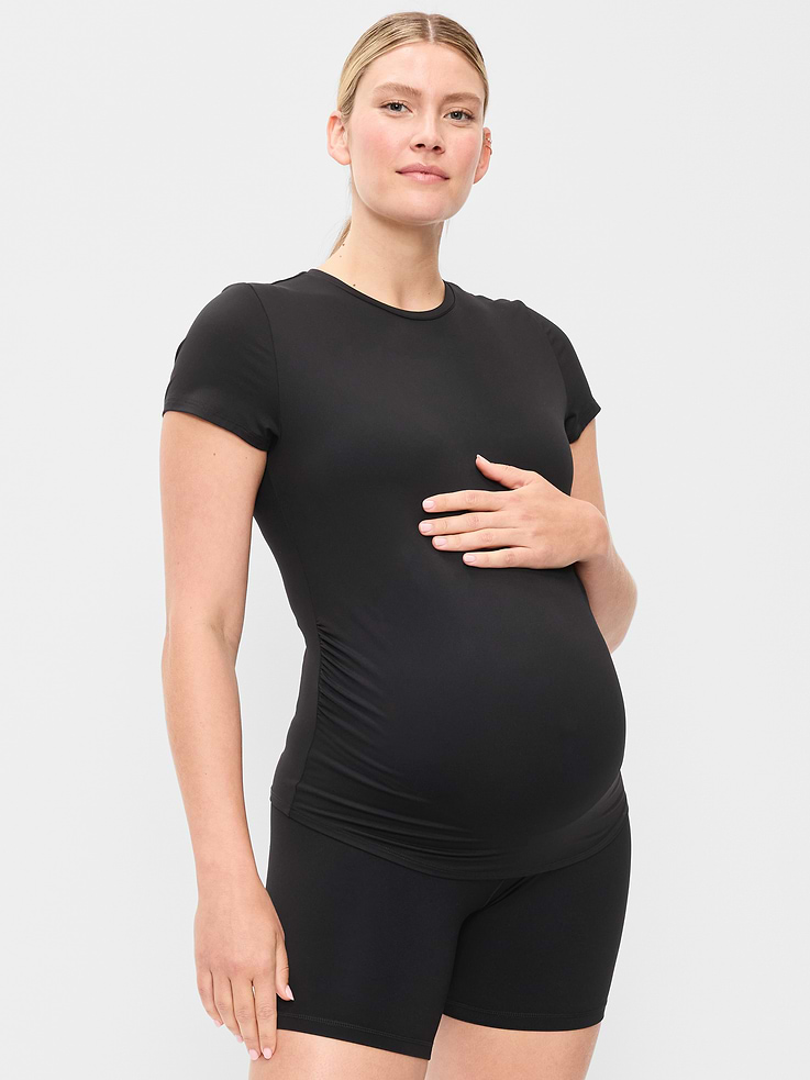 Image 1 of 4, Make your moves in Old Navy Sport's StudioSmooth: A buttery soft, breathable fabric with a barely there feel., crew neck, short sleeves, center seam at back, shirred sides for a flexible fit, sweat-wicking, 4-way stretch, sweat-wicking, Product #899944