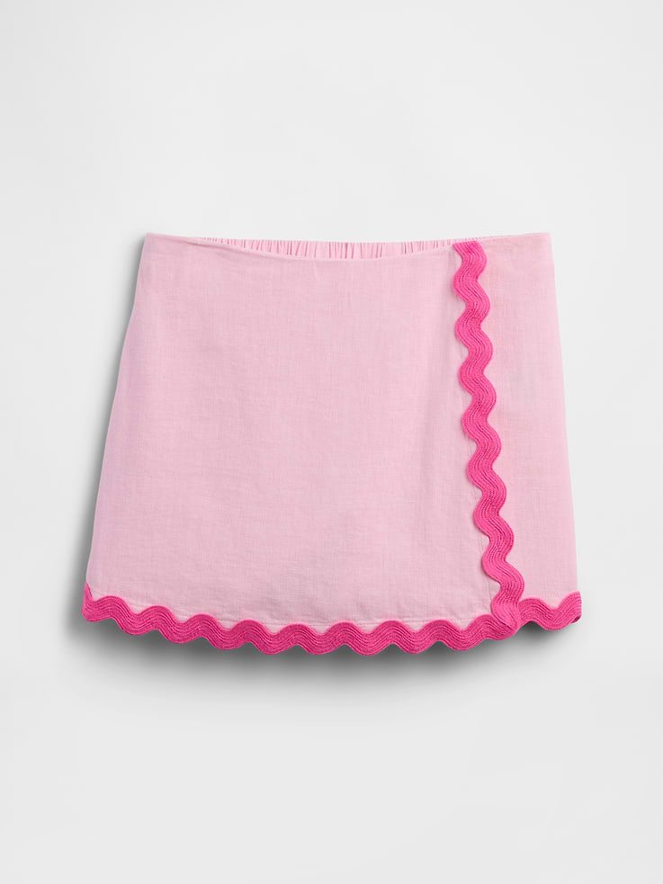 Image 1 of 3, Smooth linen blend., Elasticized waist., Ric rac trim at front and hem., Interior shorts., Note: The dye used in the crafting of this product is prone to crocking, or color transfer. Please avoid contact with light-colored fabric or upholstery., This product was made in a factory that invests in gender equity and women’s empowerment through RISE. Learn more at, Product #1175271