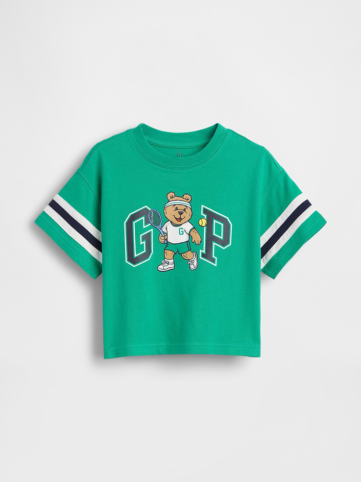 Image 1 of 2, Soft cotton jersey graphic T-shirt in an oversized fit., Crewneck., Short sleeves with Varsity stripes., Gap logo with Brannan Bear tennis graphic at front., Product #898730