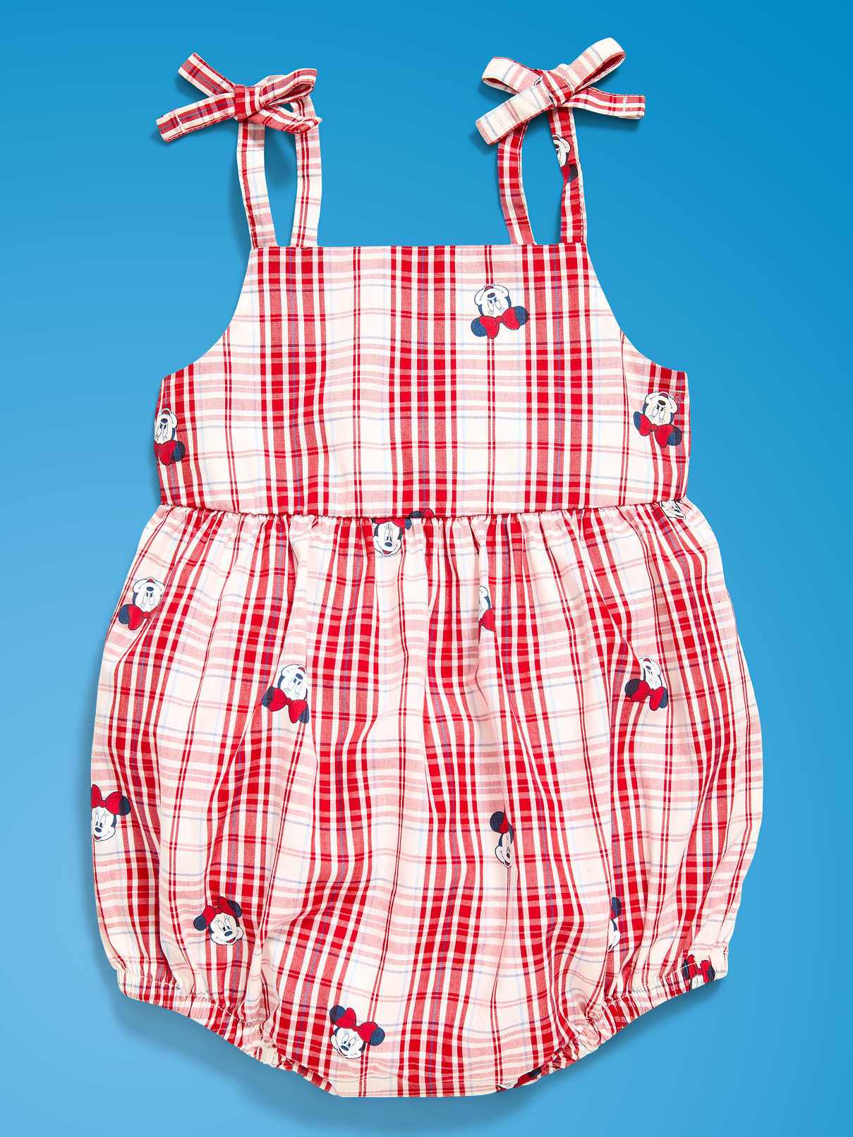 L'image numéro 1 présente Barboteuse à carreaux sans manches avec bretelles à nouer à imprimé Minnie Mouse Old Navy x Disney pour bébé