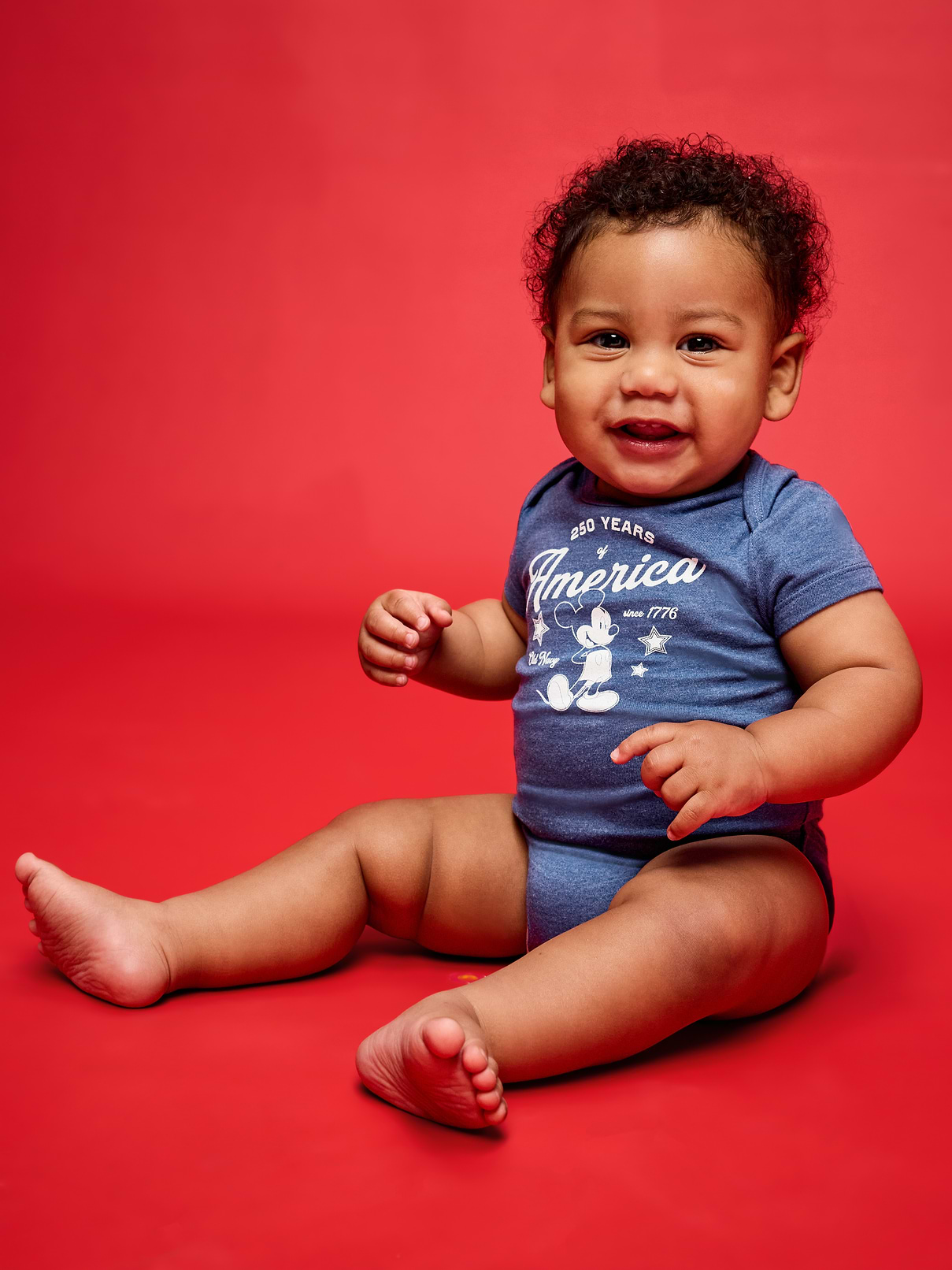 Image number 1 showing, Old Navy x Disney Mickey Mouse Short-Sleeve Unisex Graphic Bodysuit for Baby