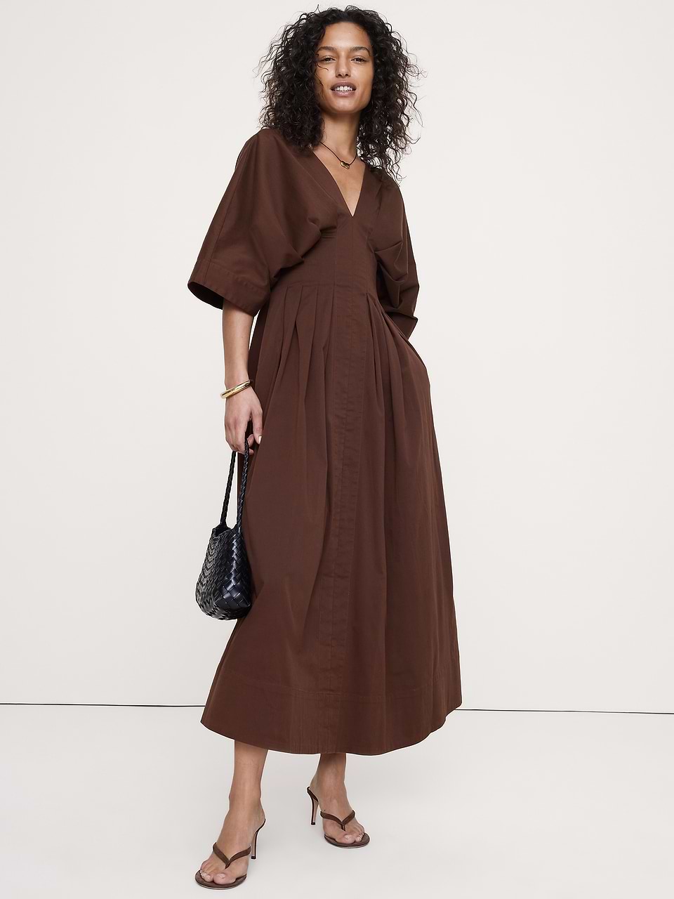 long pleated dress The One You Want Dark Green Multi Floral Pattern Maxi to the back shirred panel and invisible zipper at the back Light Blue Pleated Long Sleeve