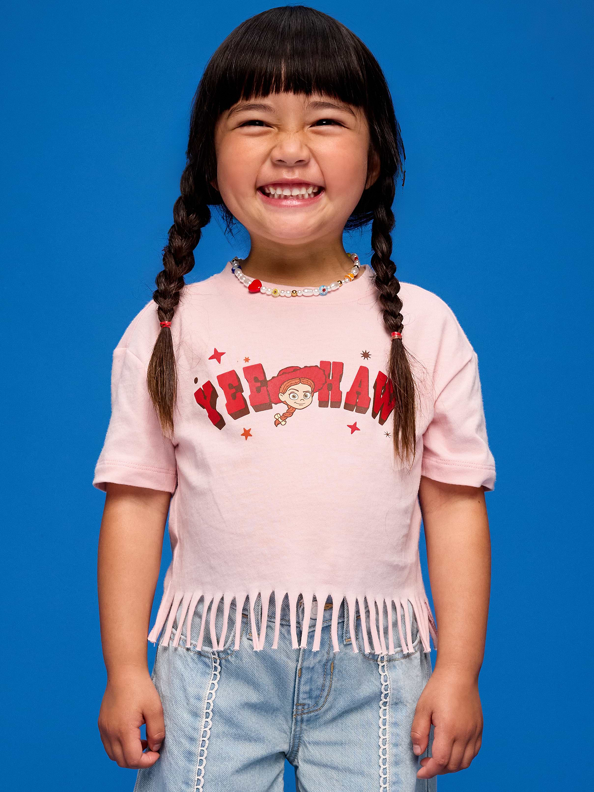 L'image numéro 1 présente T-shirt droit à ourlet à franges et à imprimé Histoire de jouets Old Navy x Pixar pour toute-petite