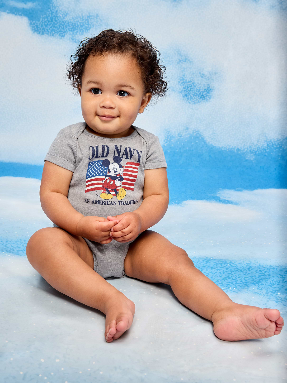 Image number 1 showing, Old Navy x Disney Mickey Mouse Short-Sleeve Unisex Graphic Bodysuit for Baby