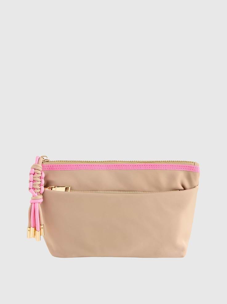 Image 1 of 2, Take your on-the-go organization to new heights with the Jet Zip Pouch., This sleek and sporty design features a top zip closure, one inner zip pocket, two inner slip pockets, and a convenient outer zip pocket for easy access., It’s crafted from durable nylon and accented with eye-catching paracord zipper pulls and gold hardware., Whether stashing travel essentials, tech accessories, or everyday must-haves, the Jet Zip Pouch keeps it all zipped up in style.