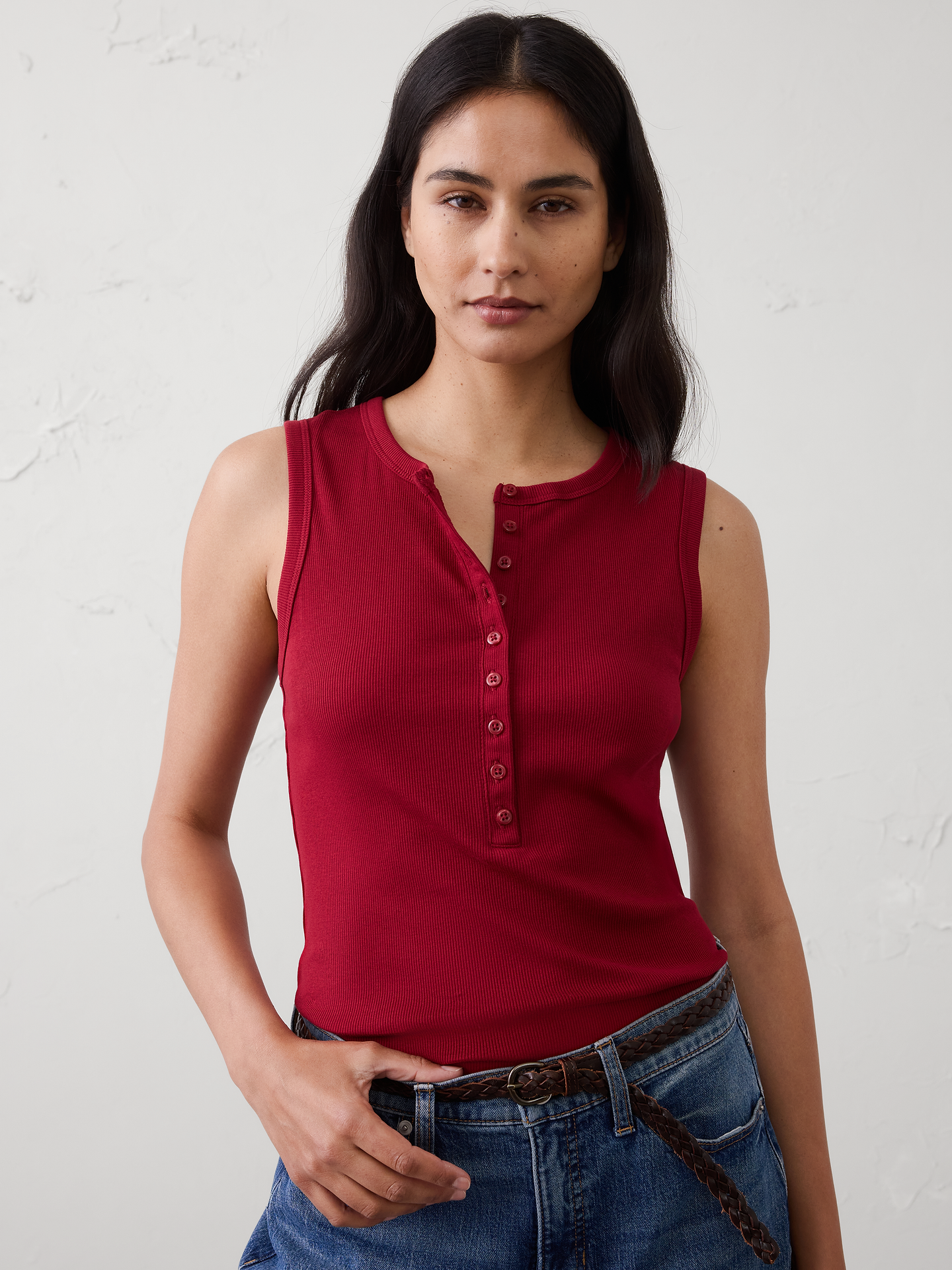 Image 1 of 4, Our top‑selling 2×2 ribbed fabric, now reimagined as an easy sleeveless Henley—perfect for everyday wear and warm‑weather dressing., Henley neckline. Sleeveless., Button-front placket., Straight hem., Made exclusively for Banana Republic Factory., Product #1174836