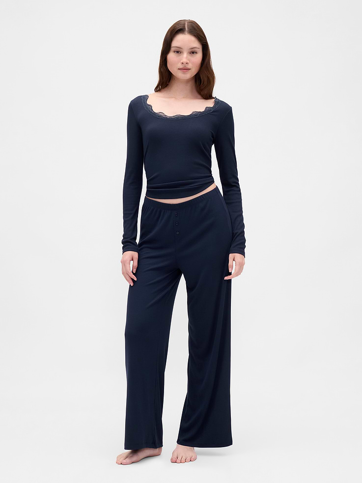 Image 1 of 5, Our slinky-soft, second-skin rib. Made with an ultra-fine texture that hangs just right., Supersoft, finely ribbed modal-blend pajama shorts., Elasticized waist with faux button fly., This product was made in a factory that invests in gender equity and women’s empowerment through RISE. Learn more at gapinc.com/equity ., Product #728687
