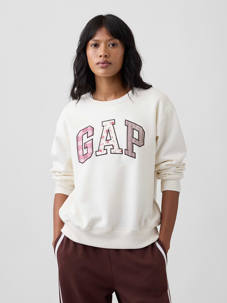 Image 1 of 5, Soft, comfy fleece., Long sleeves with banded cuffs., Crewneck., Gap logo at front., Banded hem., Product #1172777