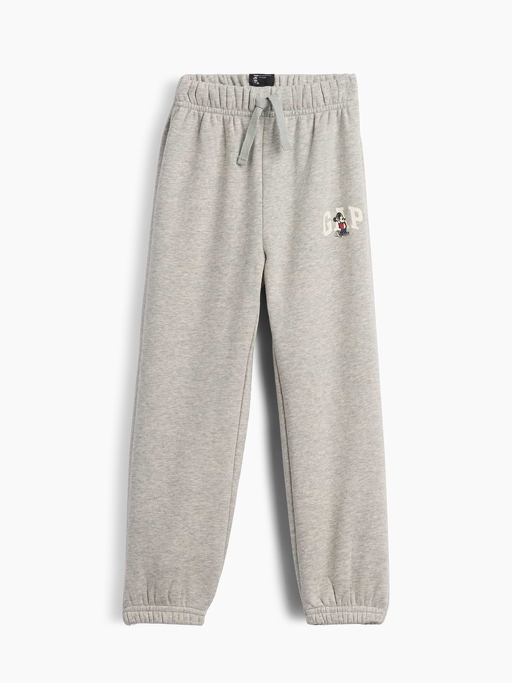 Image 1 of 3, A very special collaboration between Gap and Disney— two timeless, iconic American brands— led us to create a collection that celebrates Mickey Mouse and Minnie Mouse., This product is made with/contains 23% recycled polyester. Compared to virgin materials, using recycled materials helps reduce resource use and waste., Soft, comfy fleece., Drawcord ties at elasticized waist are functional for sizes 2T-5T., Gap logo with graphic at hip., Elasticized cuffs., Product #1178959