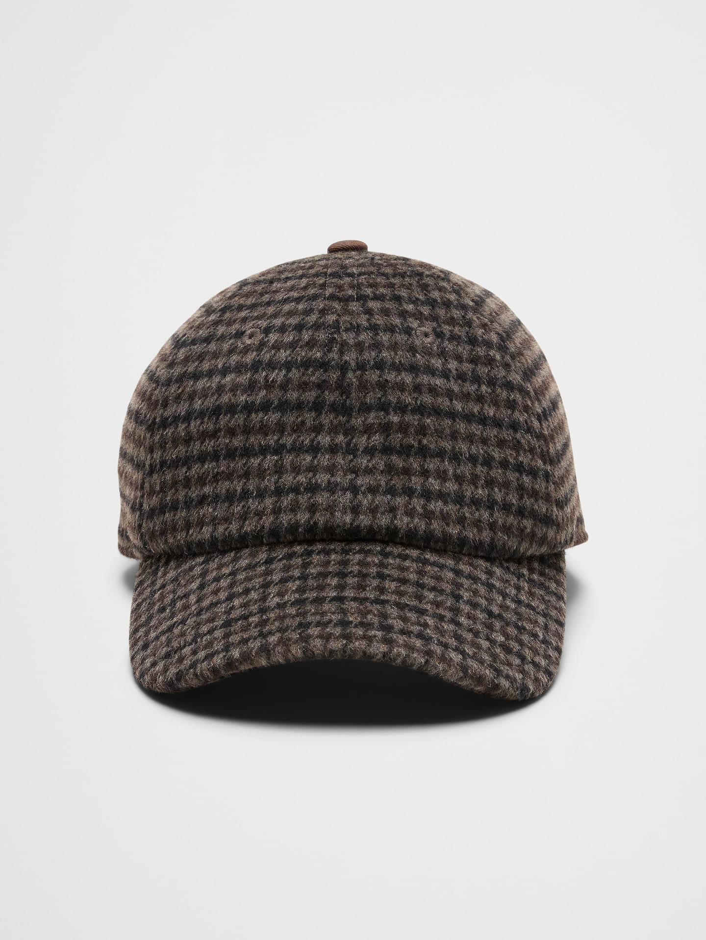 Image 1 of 1, Refresh your cold-weather accessory collection with these heritage-inspired plaid baseball caps. Featuring rich seasonal colorways—including a warm brown houndstooth and a navy-brown-black plaid—these caps combine timeless patterning with a soft wool fabrication for elevated everyday style., Structured six-panel crown., Curved brim for a classic baseball cap silhouette., Finished with an adjustable strap with metal adjuster for a personalized fit., Made exclusively for Banana Republic Factory., Product #1176583