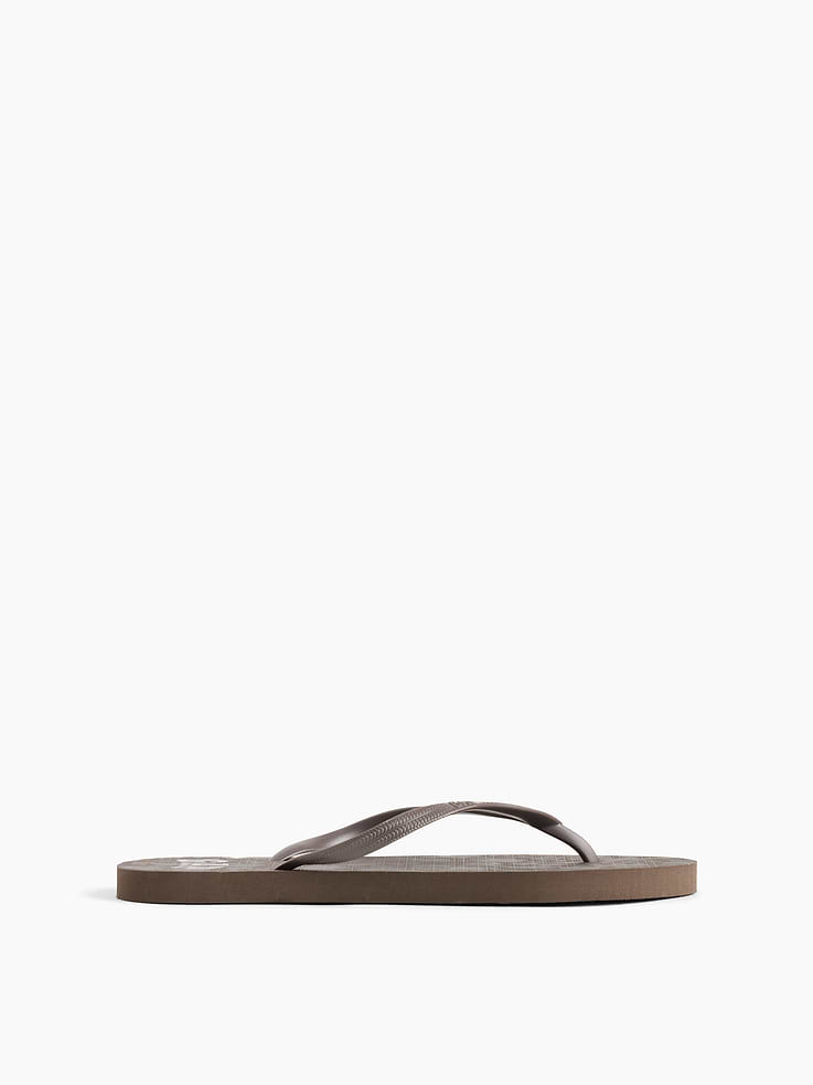 Image 1 of 4, Treaded rubber sole., Rubber straps., Gap logo at footbed., This product is not recyclable., Product #1179376