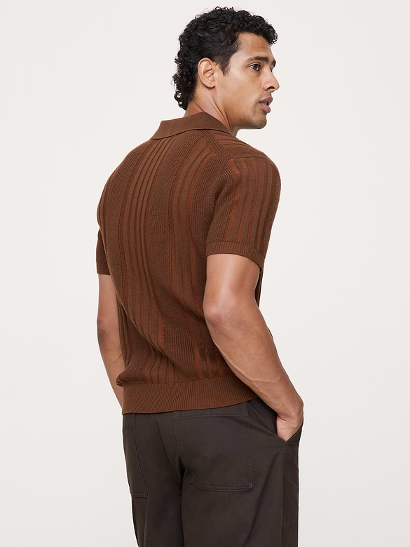 Polo en laine mérinos et coton texturé à rayures