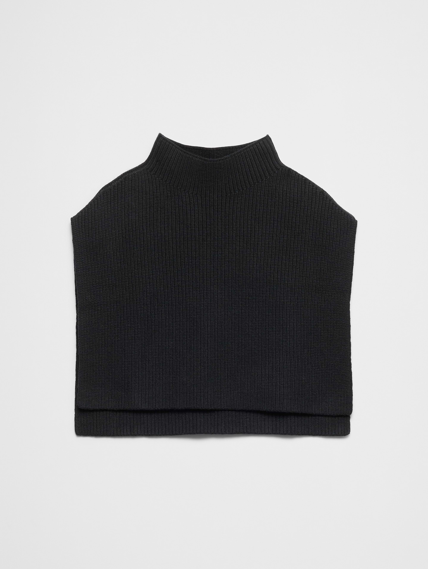 Image 1 of 5, Add warmth and dimension to your layered looks with this versatile sweater bib. Crafted from a soft, textured knit, this modern layering piece features a cozy mock neck and shoulder-covering silhouette that creates the look of a sweater without the bulk., Mock neck. Sleeveless., High-low straight hem., Made exclusively for Banana Republic Factory., Product #1183427
