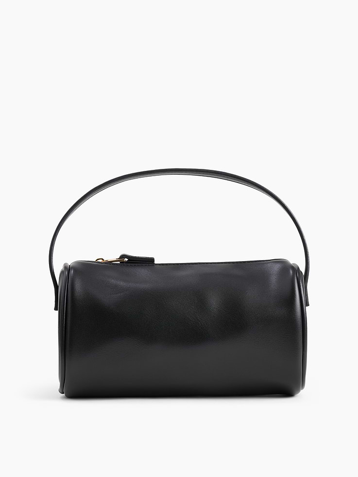 Image 1 of 3, Smooth faux leather., Hand strap., Zip closure at top., Product #1179385