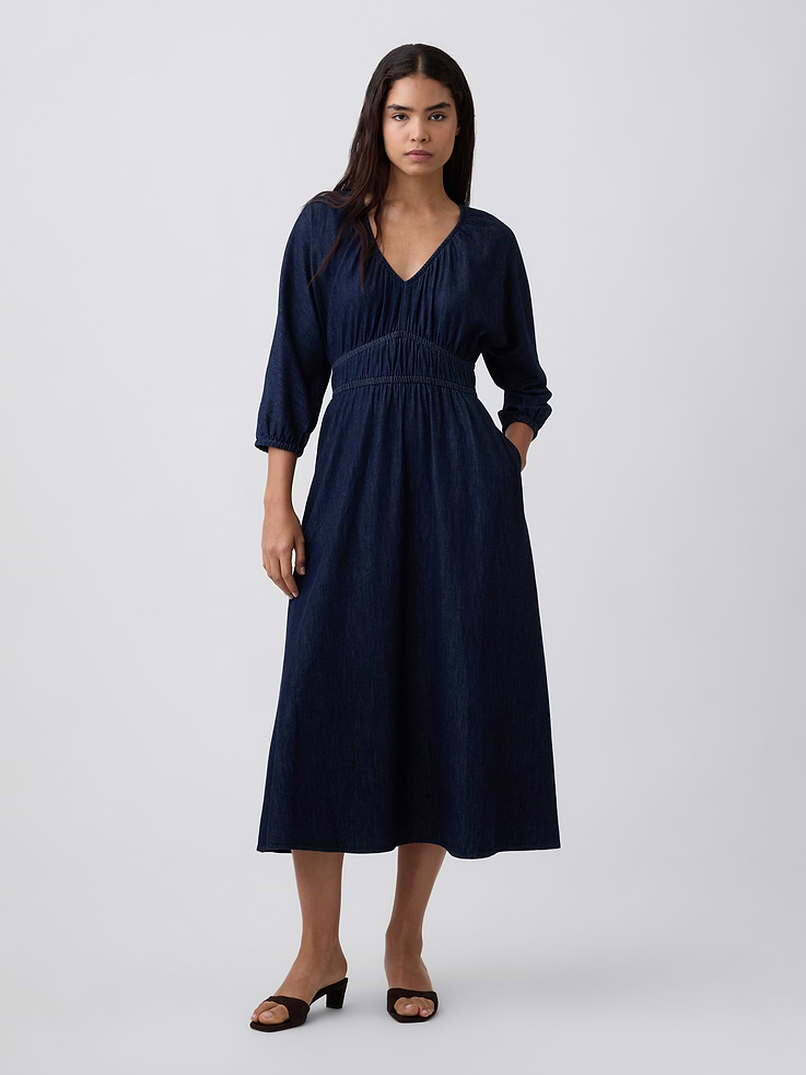 Image 1 of 6, Non-stretch denim., Indigo wash., Three-quarter sleeves with elasticized cuffs., Shirring at V-neck., Smocking and shirring at yoke., On-seam pockets., Product #1185221