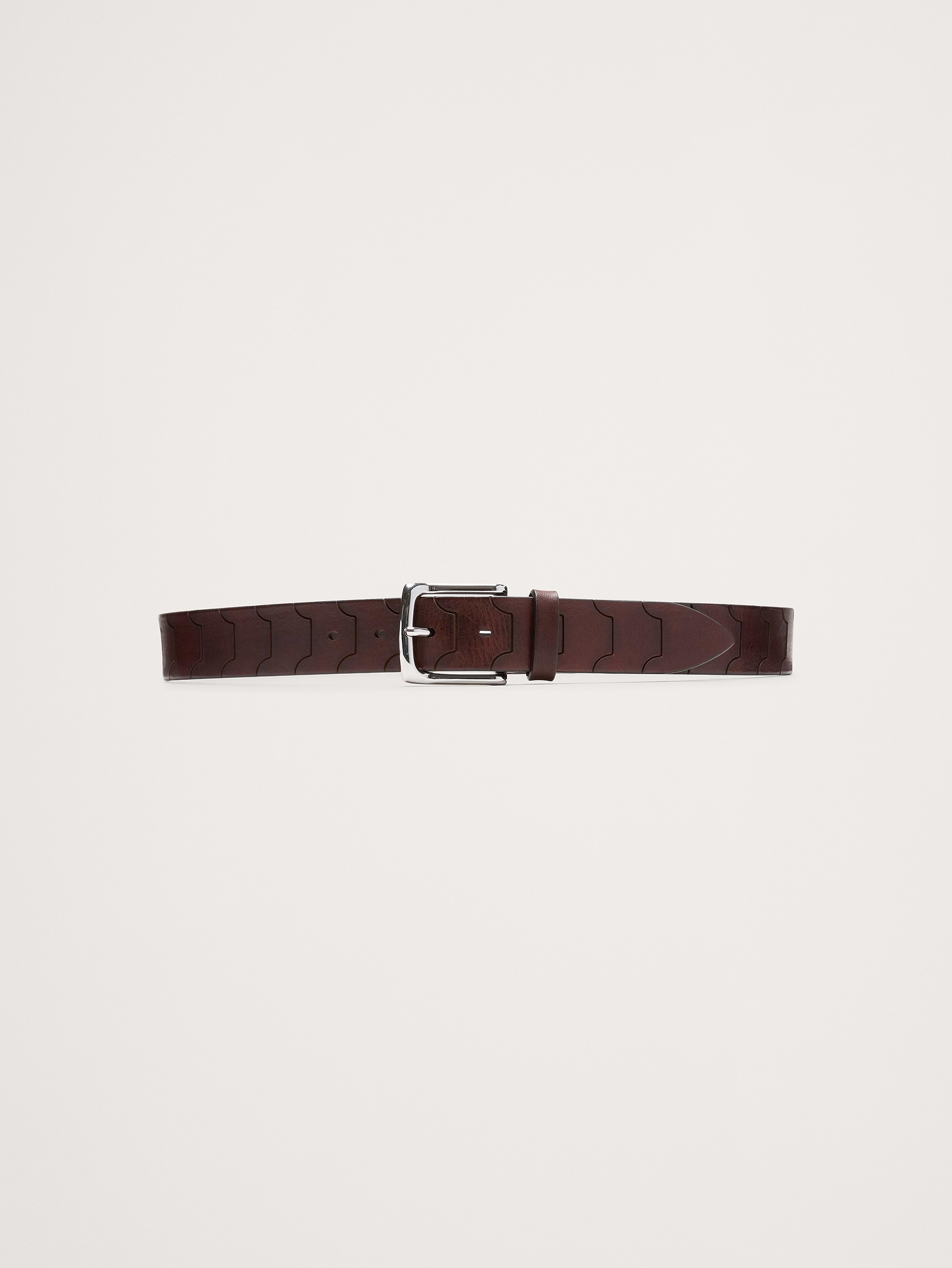 L'image numéro 1 présente Ceinture en cuir repoussé à motifs géométriques