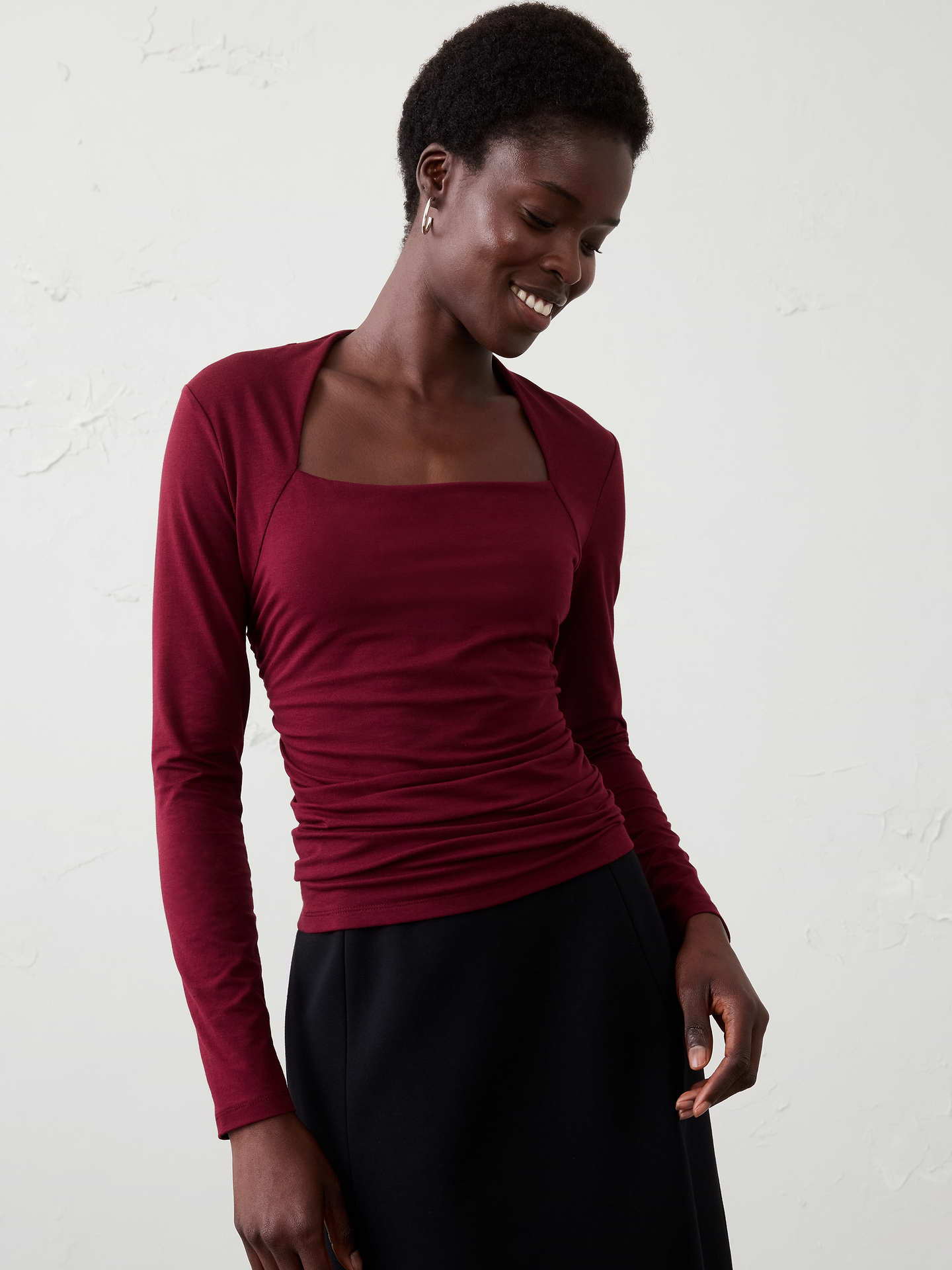 Image 1 of 4, Square neckline. Long sleeves., Fitted at the waist., Ruched side seams detailing., Soft gathering throughout the torso., Ruching continues across the back waist for allover shaping., Straight hem., Made exclusively for Banana Republic Factory., Product #1178107