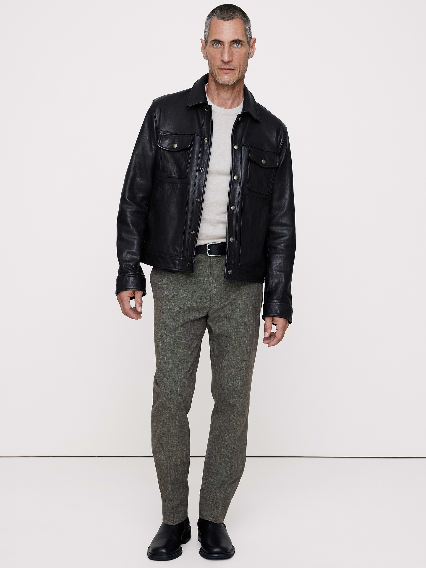 Image 1 of 8, These slim-fit dress pants are cut from a dressed-up fabric we sourced for its crisp appearance, subtle stretch, and natural wrinkle-resistance thanks to the high twist of the yarn. Breathable, Wrinkle-Resistant, Stretch, Tailored Slim Fit: Mid-rise. Tapered slim leg., Zip fly with button-tab waistband., Belt loops and after-dinner split detail at back., Front and back pockets., Unlined., Product #649136
