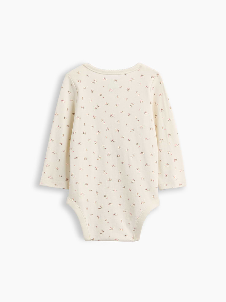L'image numéro 2 présente Cache-couche Premiers essentiels en coton biologique à motif pour Bébé