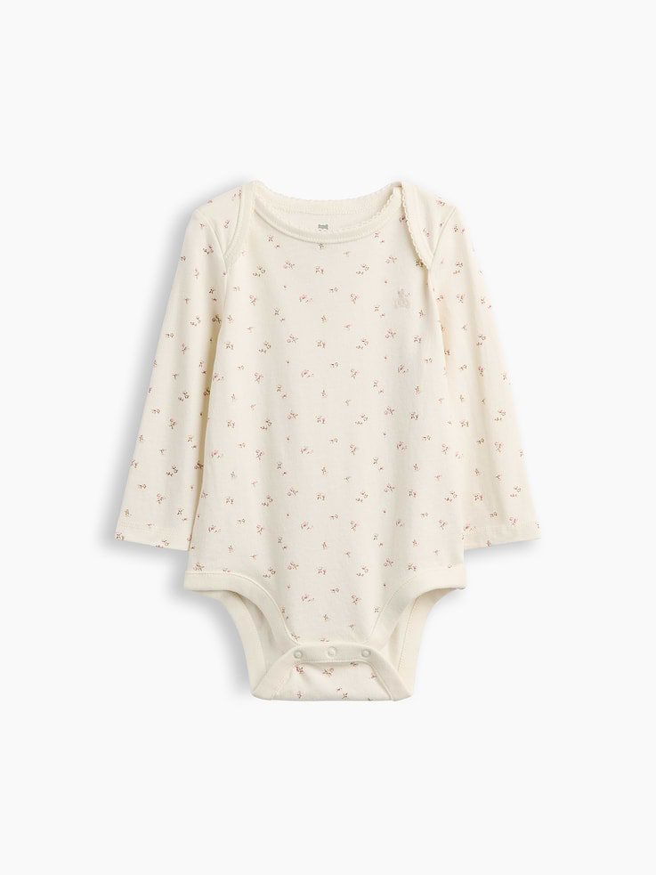 L'image numéro 1 présente Cache-couche Premiers essentiels en coton biologique à motif pour Bébé