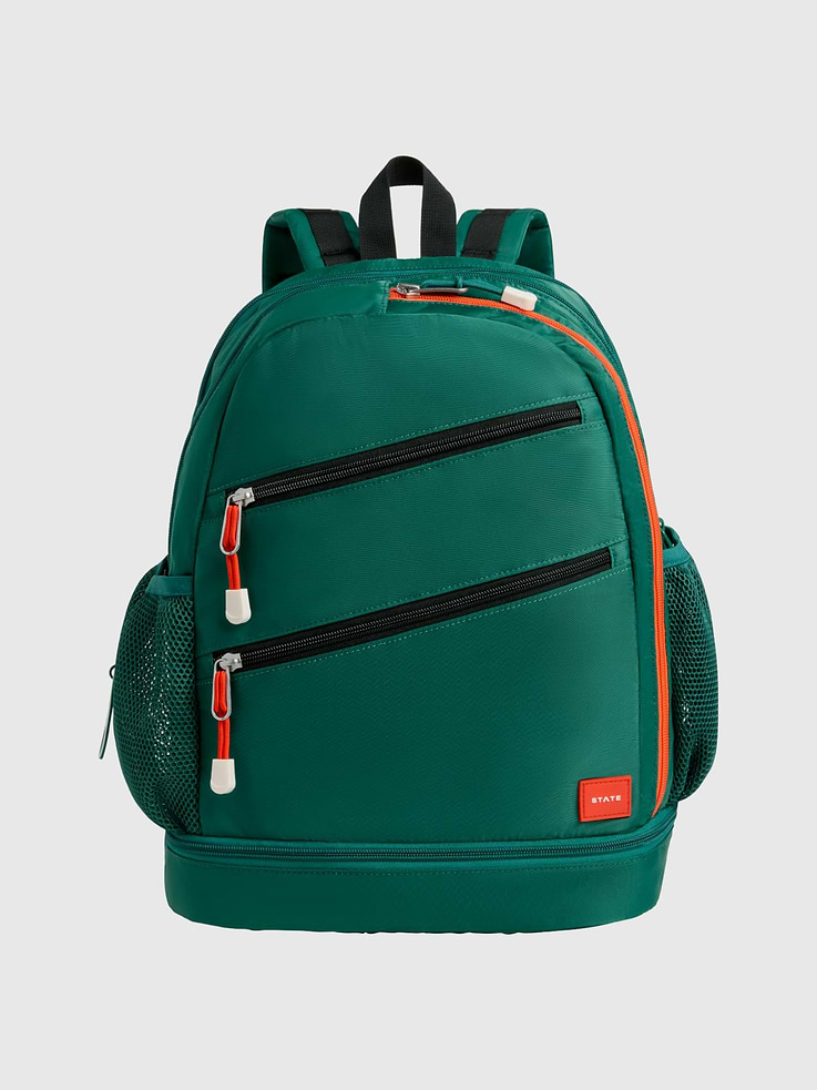 Image 1 of 4, STATE Sports Club, The tennis backpack designed to elevate their game from the court to the playground., Perfect for practice, match day, and every adventure in between, this kids' tennis backpack is as performance-driven as it is fun., 45% of this bag is made from recycled materials., For every bag sold, STATE donates a percentage of the proceeds to American families in need., STATE is the family bag company that’s carrying everyone, everywhere, through the journey of life with open hands.