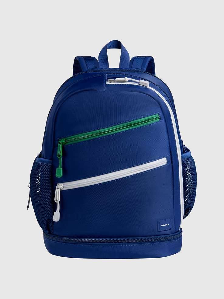 Image 1 of 5, STATE Sports Club, This tennis backpack keeps racquets, gear, and essentials organized from the court to the playground., 45% of this bag is made from recycled materials., For every bag sold, STATE donates a percentage of the proceeds to American families in need., STATE is the family bag company that’s carrying everyone, everywhere, through the journey of life with open hands.