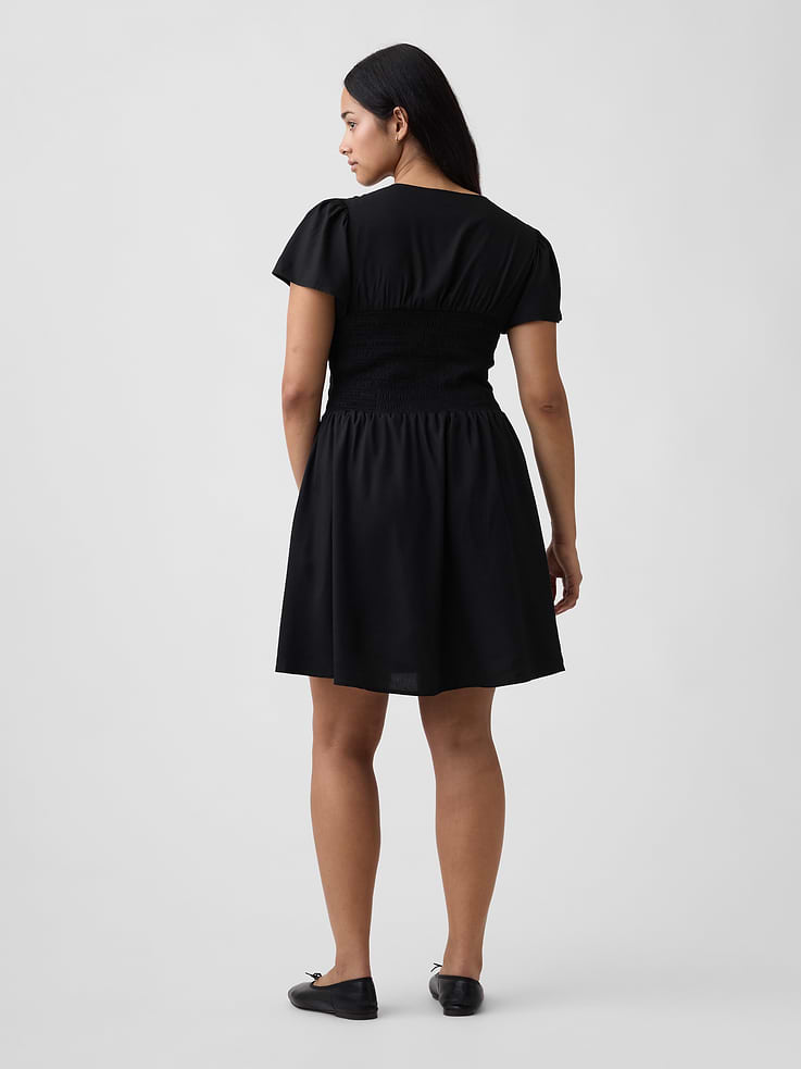 Image number 5 showing, Smocked Flutter Sleeve Mini Dress