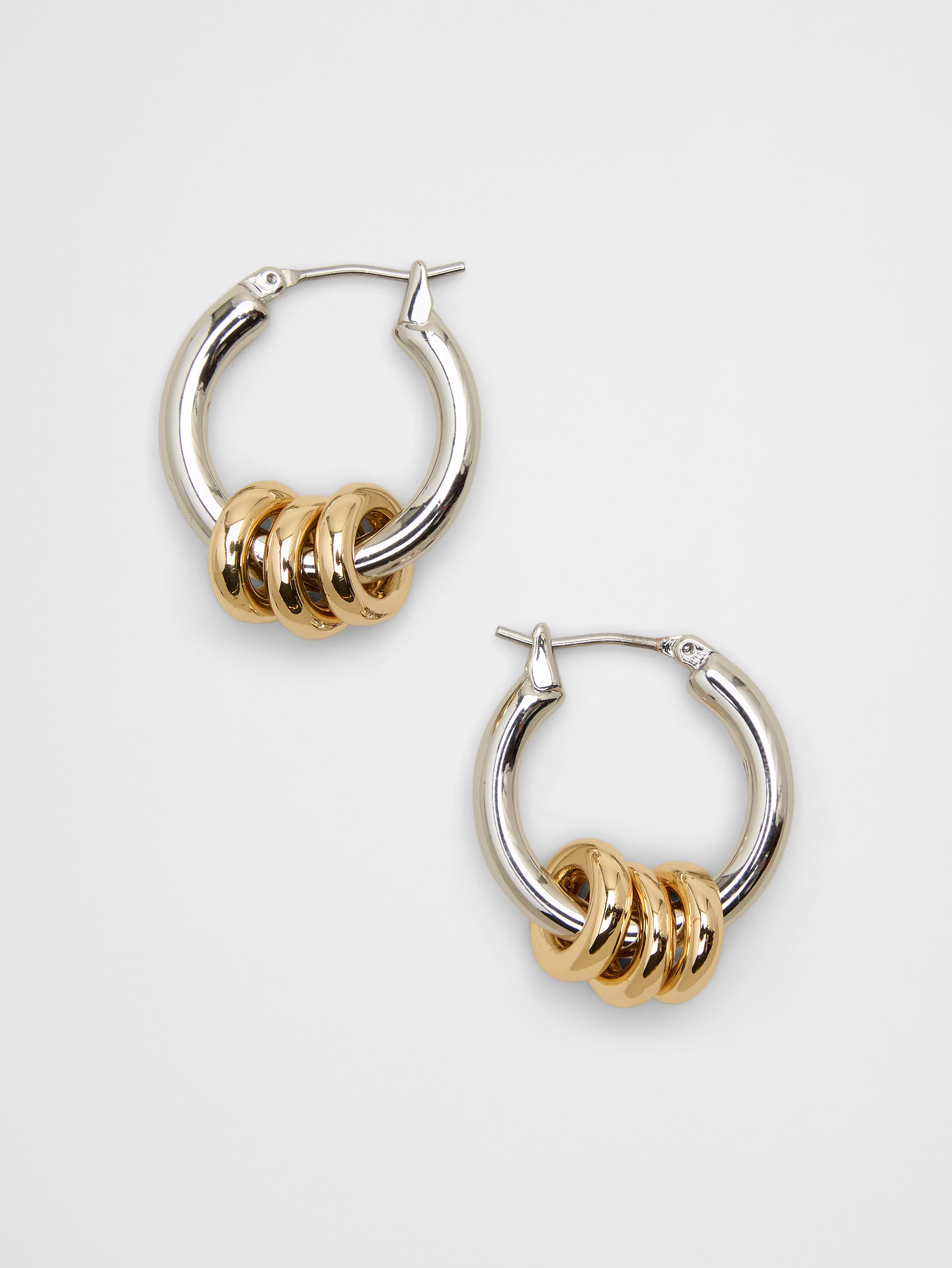 Image number 1 showing, Mixed Metal Triple Ring Hoop Earrings
