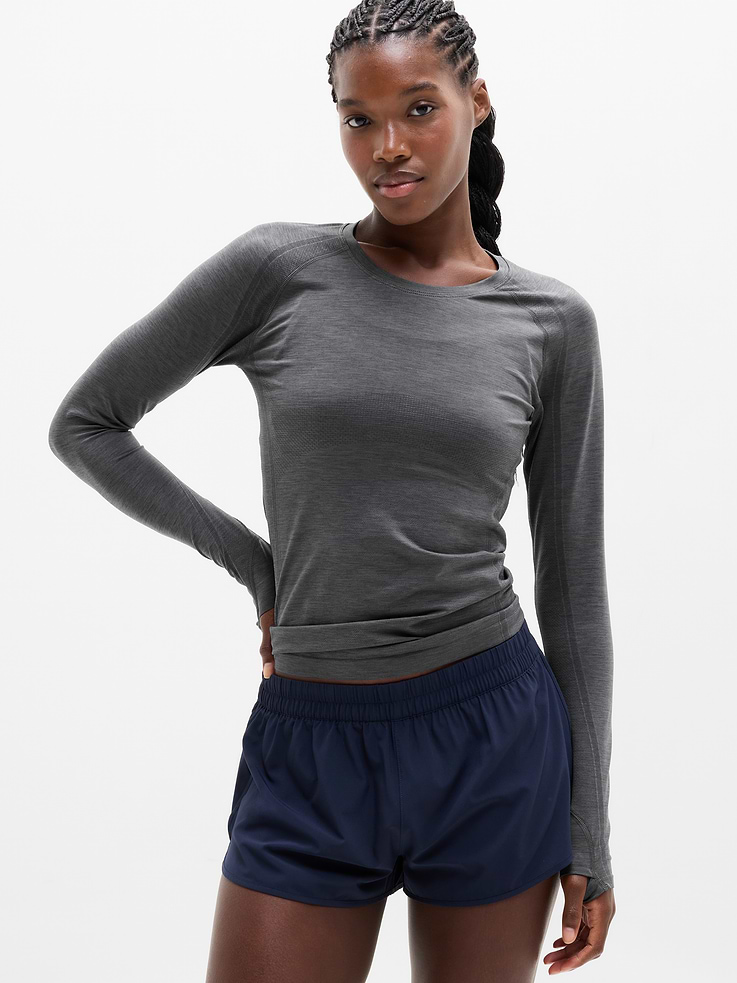 Image 1 of 6, FOR: Medium to high-impact workouts at the gym, studio, or outdoors, FEEL: Enhanced yarns deliver soft stretch and quick recovery, keeping you comfortable while you push your limits, FAVE: The workout top you love, now with upgraded stretch, sweat-wicking power, and sleek style, Seamless construction for minimal chafing, Functional mesh panels allow for optimal movement and breathability, Thumbholes lock your fit in place, Grippers at inner hem prevent it riding up, Product #1177318