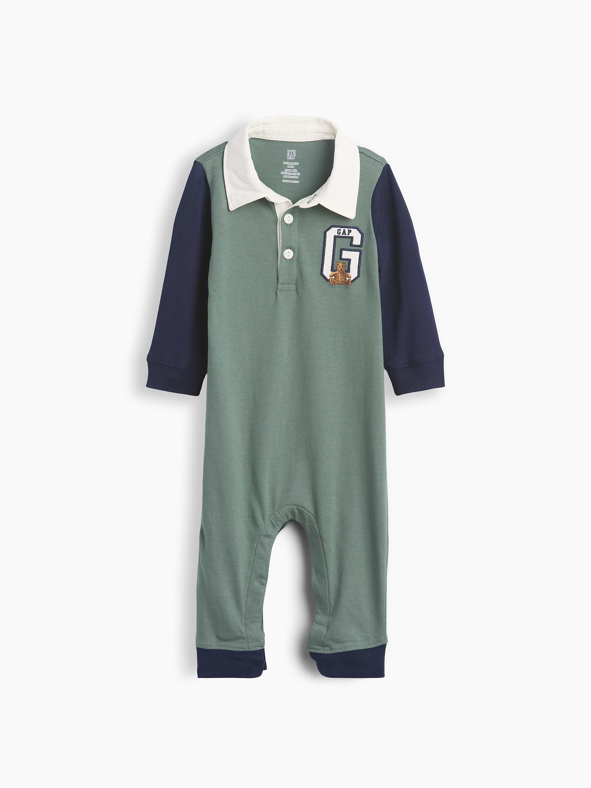 Image 1 of 3, Soft cotton jersey baby one-piece., Spread collar with front button placket., Long sleeves., Embroidered Brannan Bear at chest., Banded cuffs., Snaps at inseam for easy dressing and diapering., Certain styles have a Gap varsity-style "G" logo at chest and allover colorblock design., Certain styles have allover stripes., Product #913843