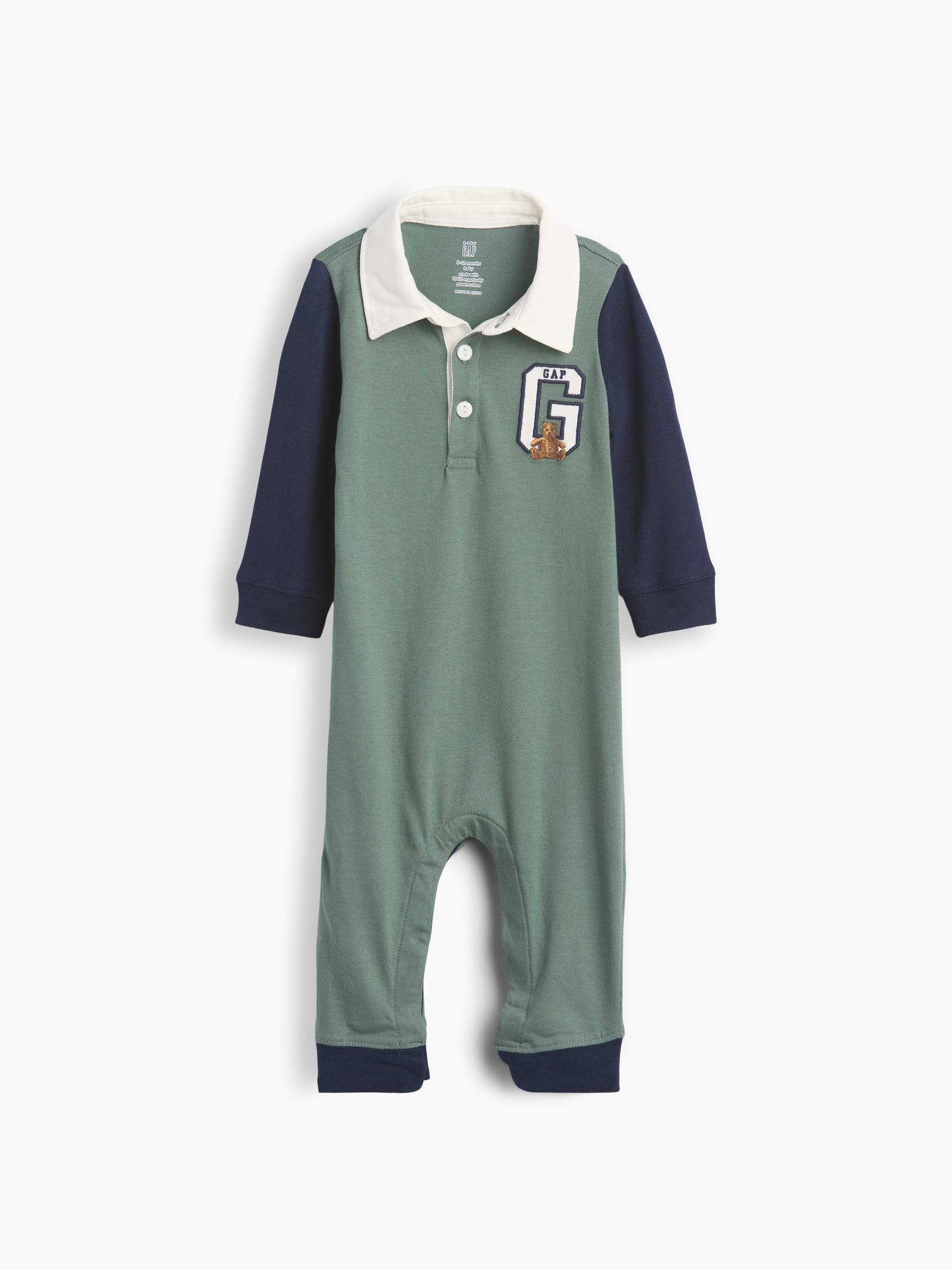 Image 1 of 3, Soft cotton jersey baby one-piece., Spread collar with front button placket., Long sleeves., Embroidered Brannan Bear at chest., Banded cuffs., Snaps at inseam for easy dressing and diapering., Certain styles have a Gap varsity-style "G" logo at chest and allover colorblock design., Certain styles have allover stripes., Product #913843