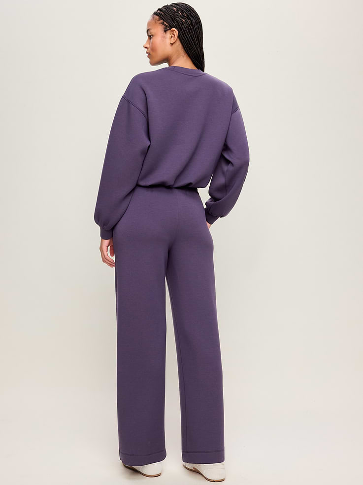 L'image numéro 3 présente Pantalon jambe large à taille haute en molleton qui reprend sa forme