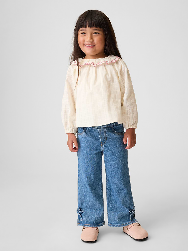 L'image numéro 1 présente Jean sportif à ourlet fendu à boucles décoratives pour Bébé et Tout-petit