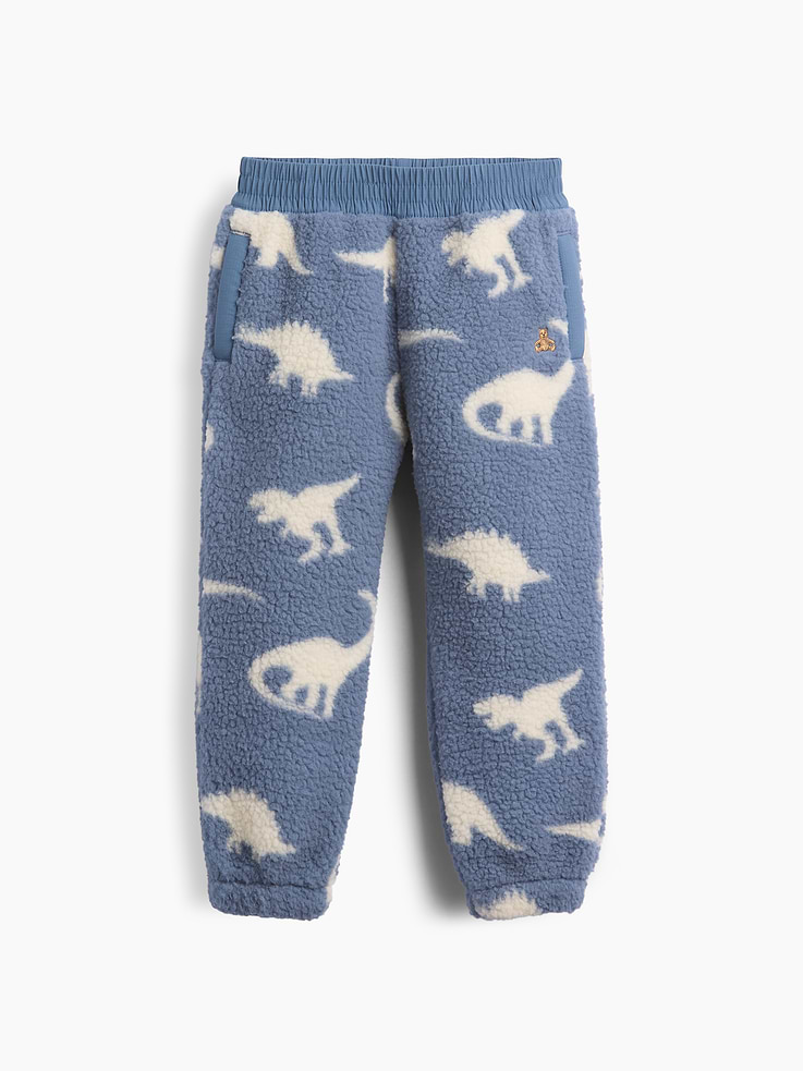 L'image numéro 1 présente Pantalon de jogging en sherpa à motif de dinosaures pour Bébé et Tout-petit