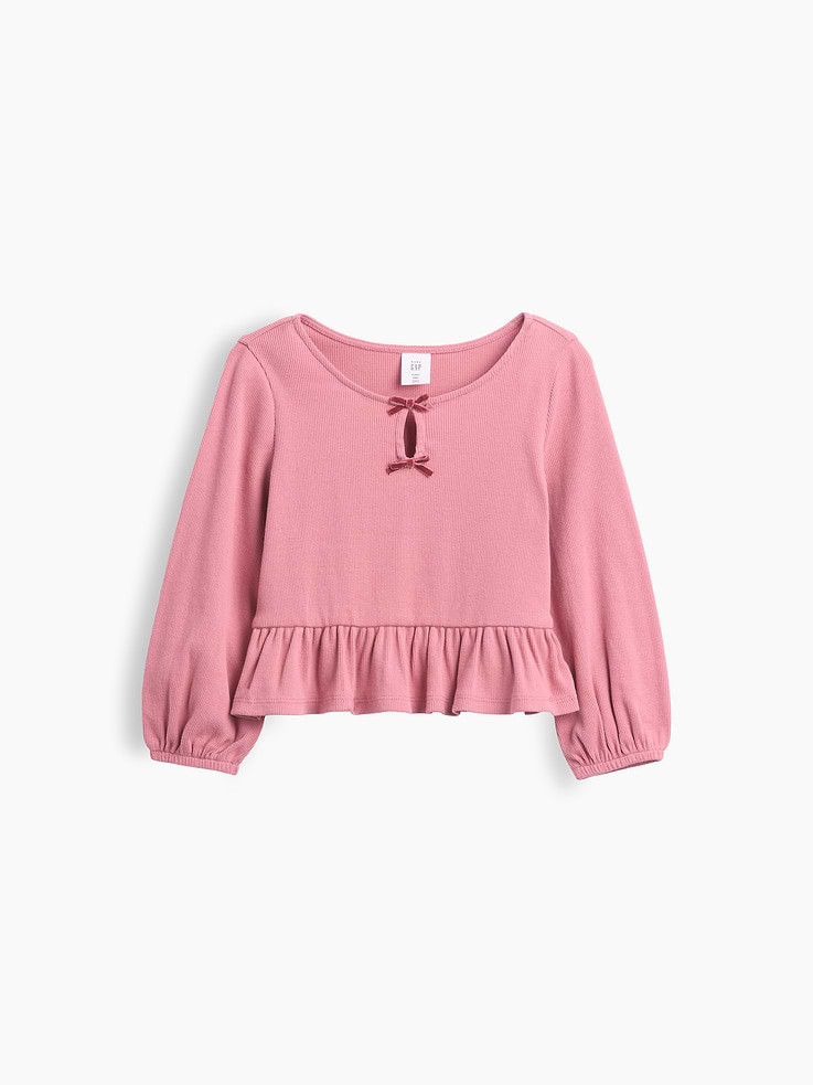 Image 1 of 2, Soft, ribbed cotton top., Round neck with keyhole opening and tacked bows at front., Long sleeves with elasticized cuffs., Shirring at peplum hem., Product #1182247