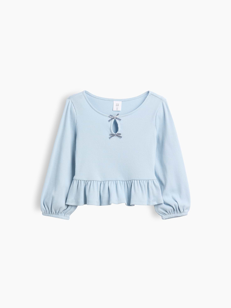 Image 1 of 2, Soft, ribbed cotton top., Round neck with keyhole opening and tacked bows at front., Long sleeves with elasticized cuffs., Shirring at peplum hem., Product #1182247